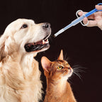 Nuanchu dog pill dispenser gun showing the interchangeable liquid watering nozzle