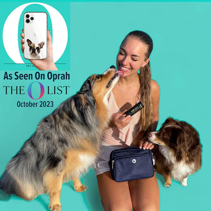 Close-up of Puppington pet training bag showing the built-in poop bag dispenser slot