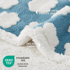 LE SURE double sided dog blanket spread over a modern living room couch