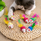 Faux fur cat toy mouse being held to demonstrate the lightweight 5.5 inch design