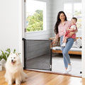 Perma Child Safety Retractable Baby Gate front view installed in an open doorway.