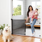 Perma Child Safety Retractable Baby Gate front view installed in an open doorway.