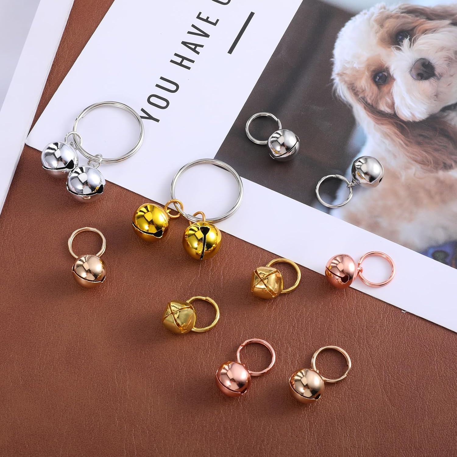 Lightweight chrome plated puppy collar bell charms displayed in multiple color options.