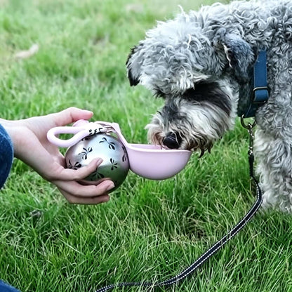 Compact spherical 285ml dog water bottle with integrated carrying strap