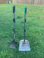 Close up of the thirty six inch long extended handle on the metal pet waste remover eliminating the need to bend over.
