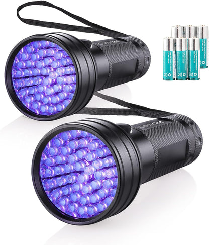 Consciot pet urine finder light illuminating hidden stains in a dark bedroom environment.