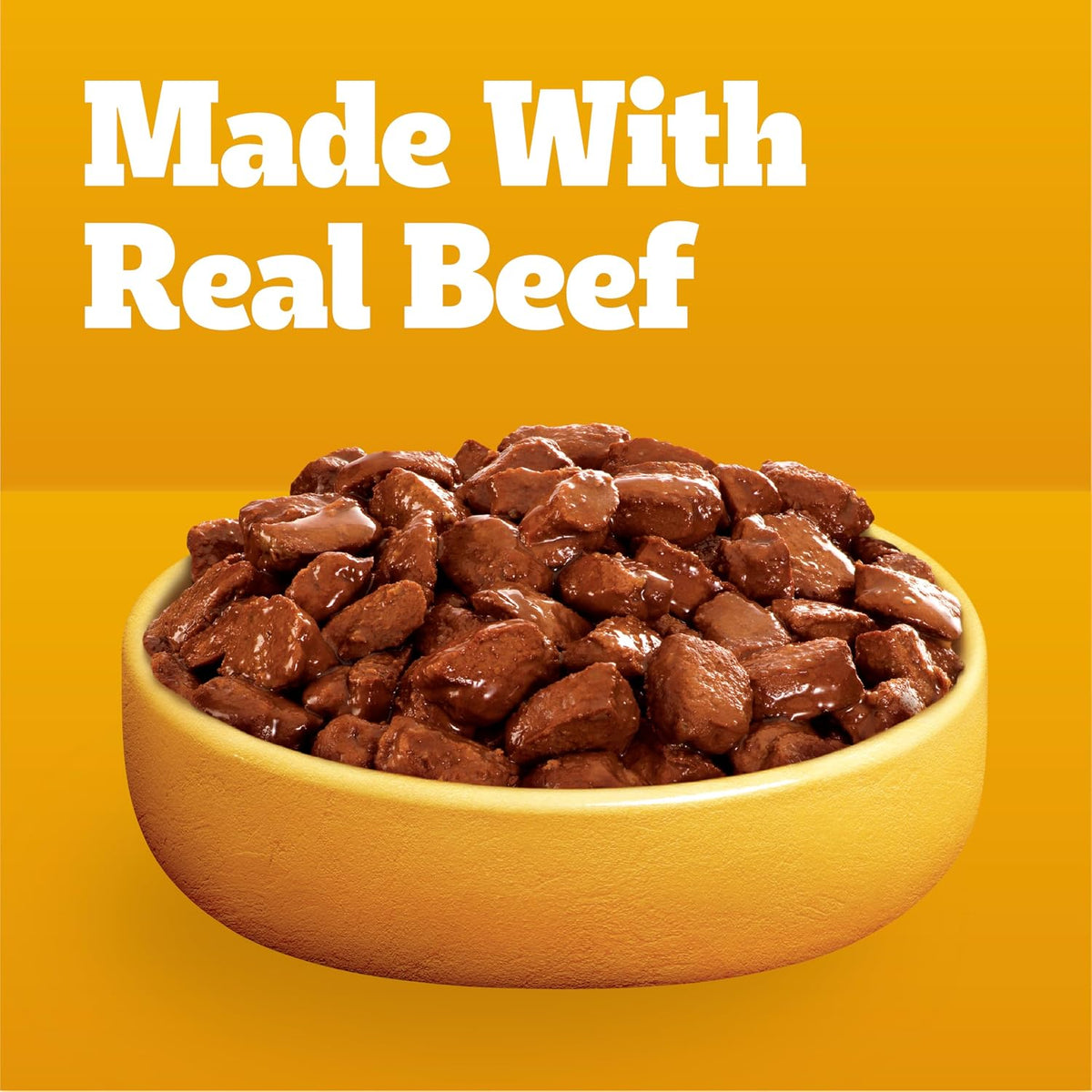 Adult dog eating Pedigree Choice Cuts wet food from a bowl