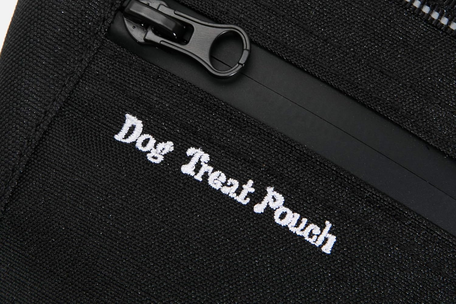 eBasics black dog treat carrier close up on the premium nine hundred denier polyester material