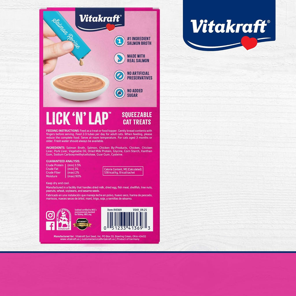 Vitakraft liquid cat treat squeeze tube being poured over dry food
