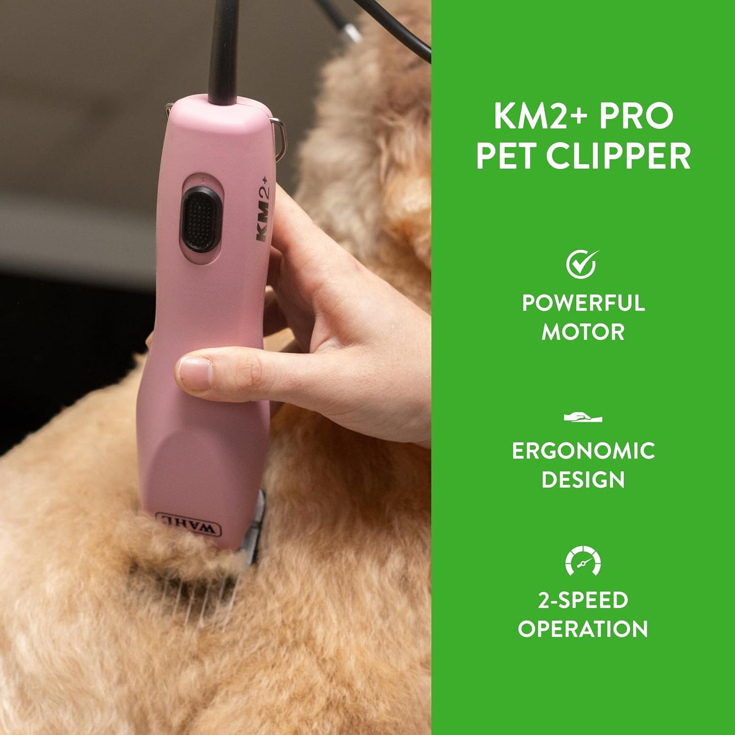 Side profile of the ergonomic pink Wahl Professional KM2 Plus animal grooming clipper