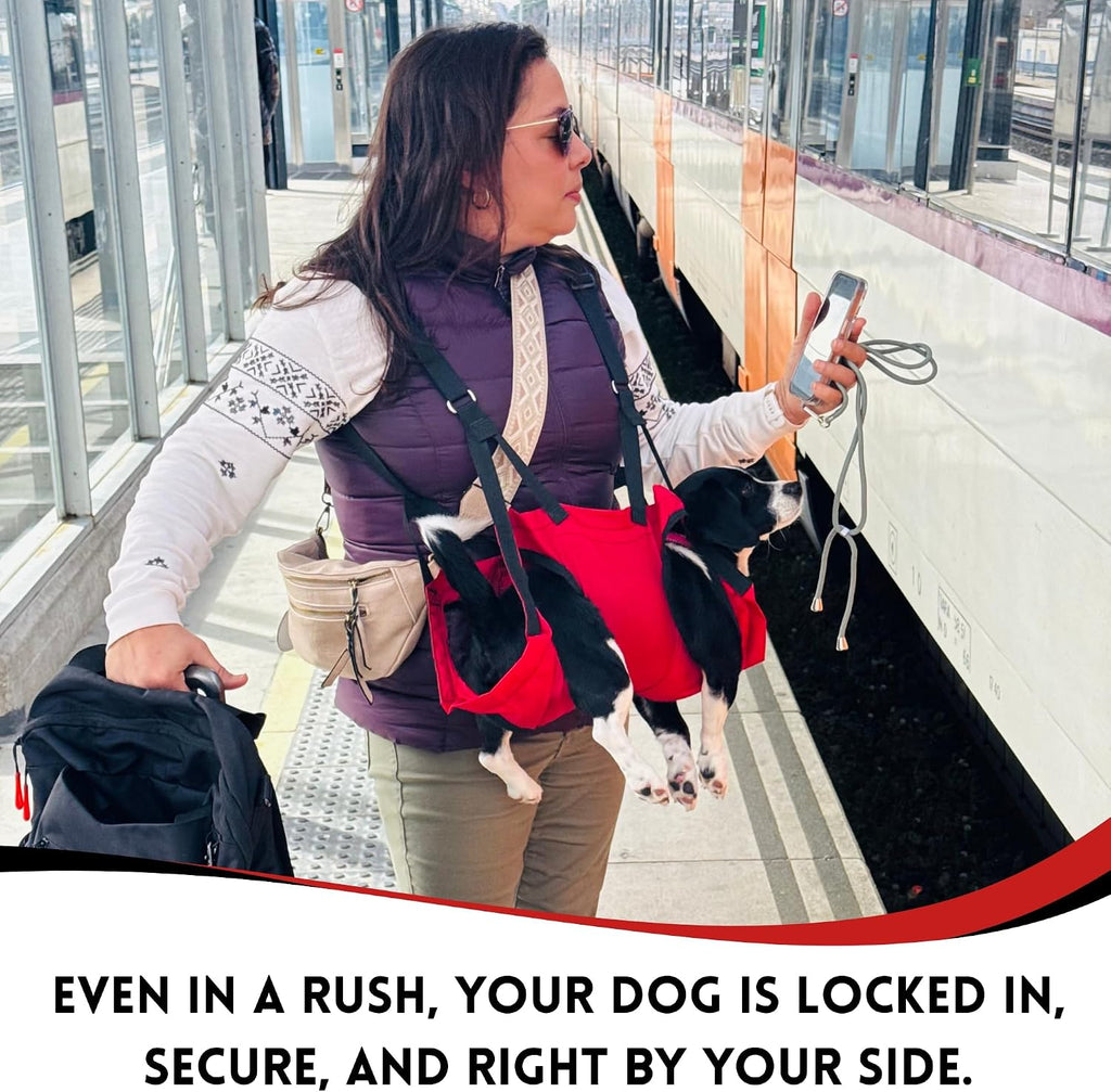 Person wearing red Fido Pro Airlift dog sling while hiking