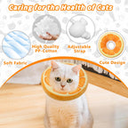 Side profile of a kitten sleeping comfortably using the orange Maiiu recovery collar as a pillow.