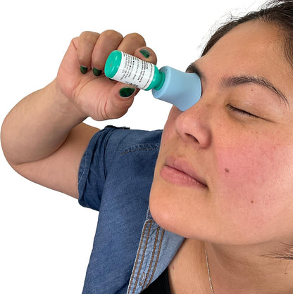 e-Pill TimeCap Eye Drop Reminder and Guide front view showing the blue electronic cap and flexible guide cup