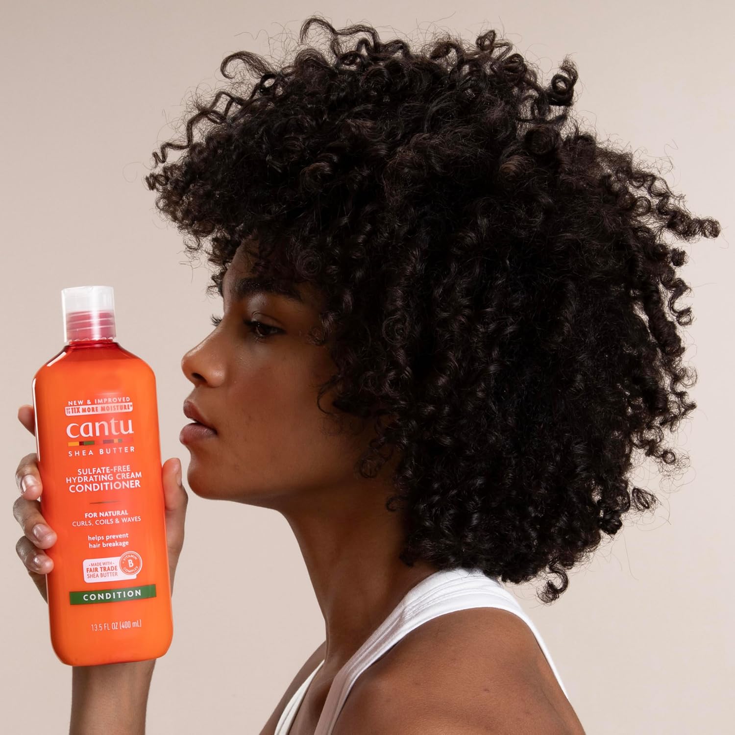 Back label of Cantu hydrating cream conditioner with directions for dry hair care