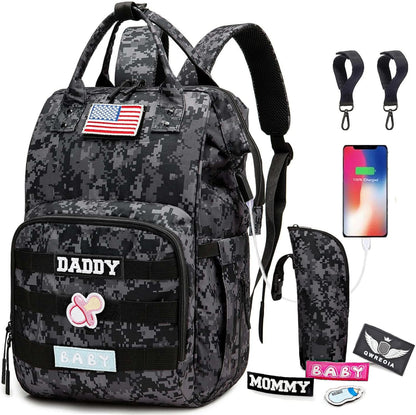 Qwreoia camo diaper bag backpack front view showcasing black and gray pixelated tactical camouflage pattern and daddy patch