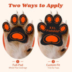 Bottom view of dog paw showing rubberized grip texture