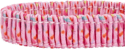 Close up of pink tulip floral pattern on cat collar