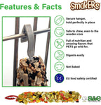 Vegetable chew treat sticks hanging inside pet wire cage