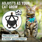 Side view of an adult cat wearing the black OutdoorBengal escape proof harness