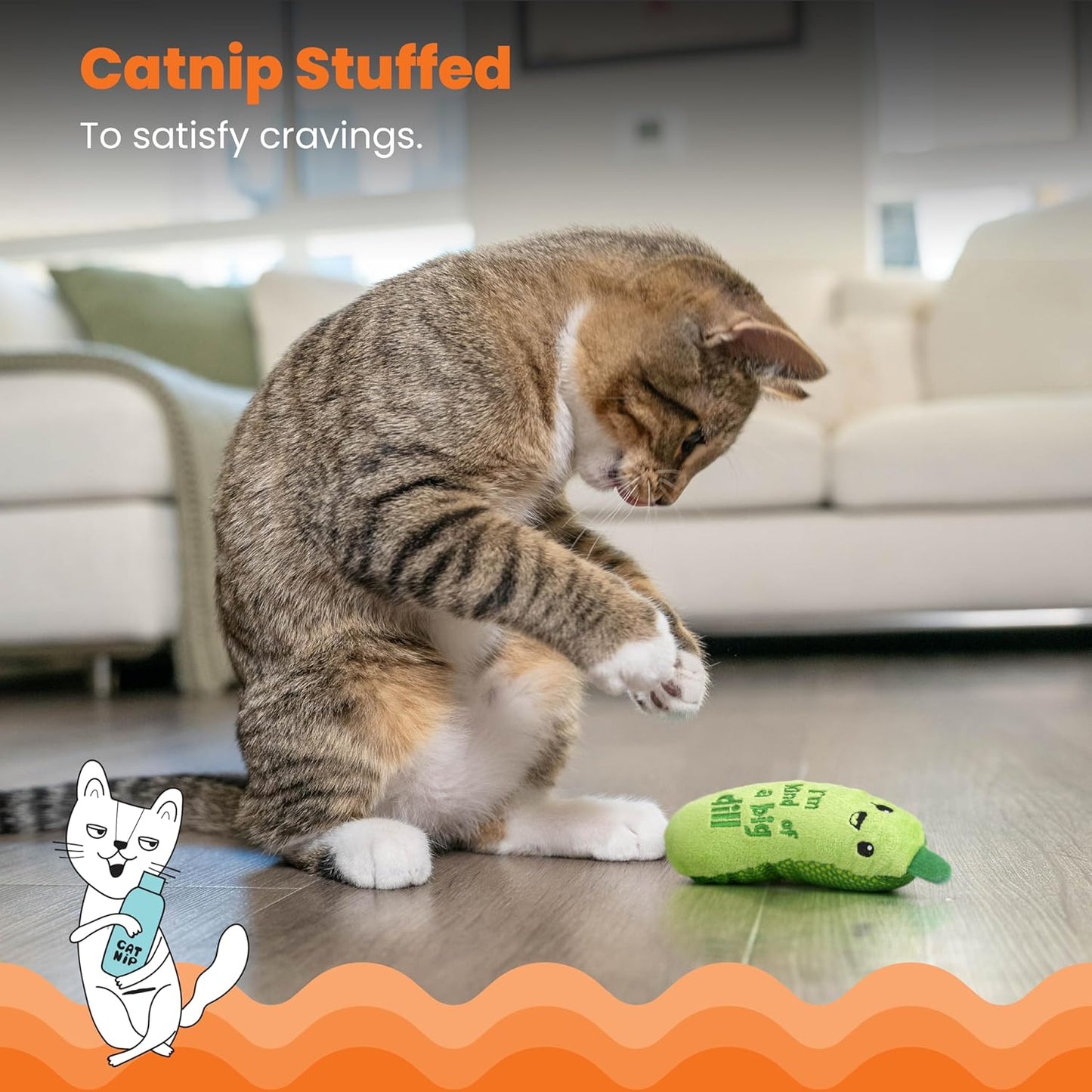 Cat playing with Catstages Crunchy Pickle Kicker toy