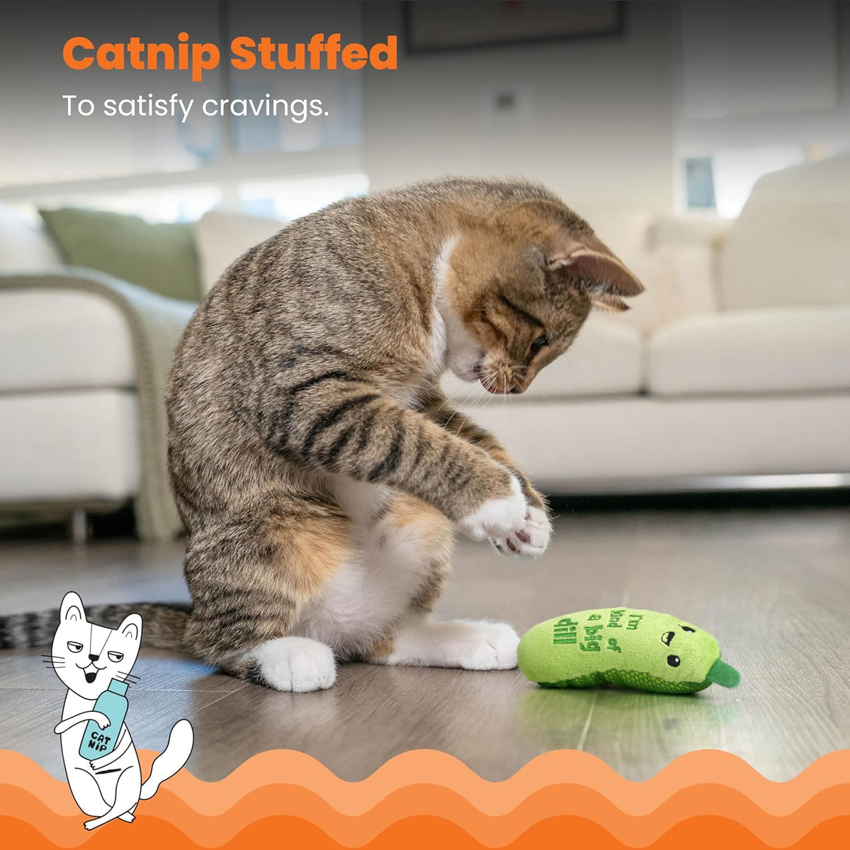 Cat playing with Catstages Crunchy Pickle Kicker toy
