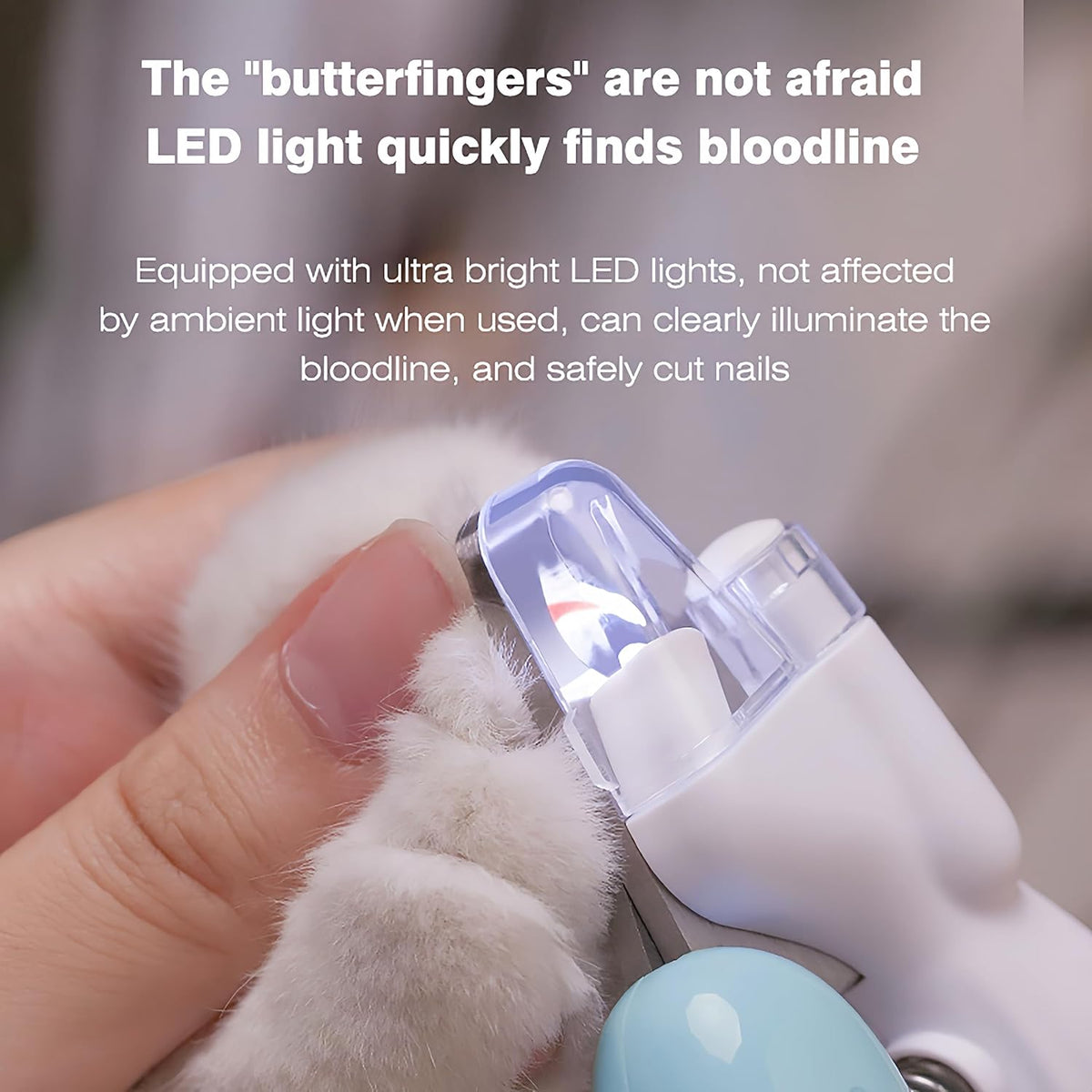SHAOMABA illuminated claw cutter demonstrating the transparent nail catcher attachment.