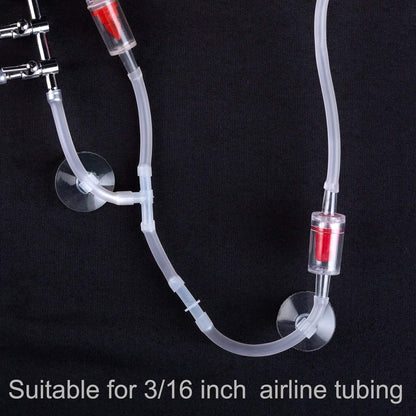 Clear plastic hose holder clamps securing three-sixteenth inch tubing.