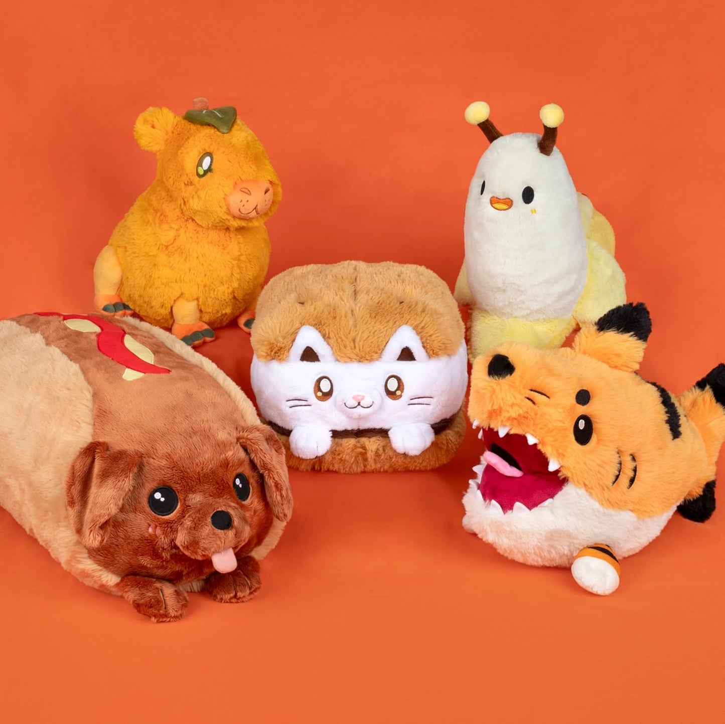 Squishable yellow and brown cat bee plushie compact stackable design close up