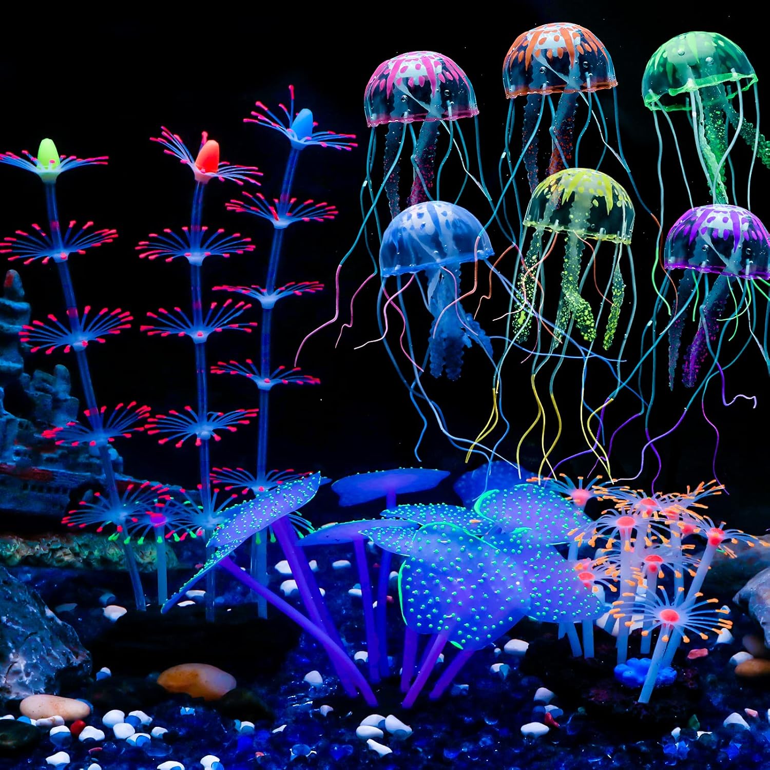 Uniclife 4 Pack Fish Tank Decorations front view of glowing silicone jellyfish and coral plants under blue aquarium lighting.