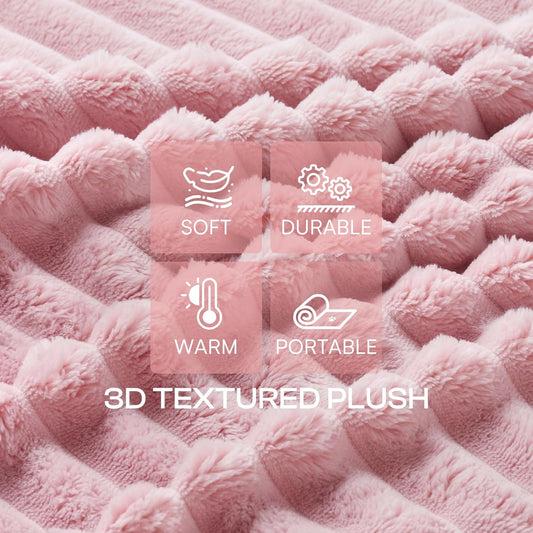 Three pack of premium flannel calming puppy blankets neatly folded on a modern sofa