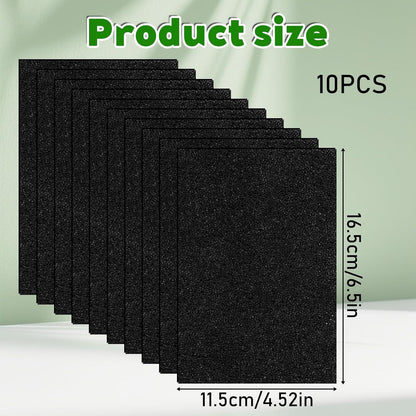 Trimmable black carbon filter sheets being measured for custom pet litter box fit