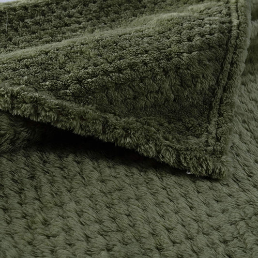 CUTEMATE cozy dog blanket draped neatly over a modern living room couch.