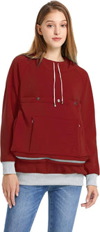 Hidden side utility pockets on the ALYC pet pouch pullover holding a smartphone
