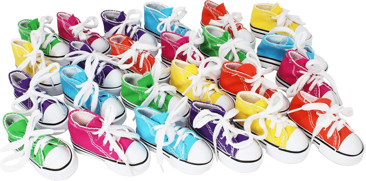 Group of assorted colored mini sneaker toys for bird cage enrichment