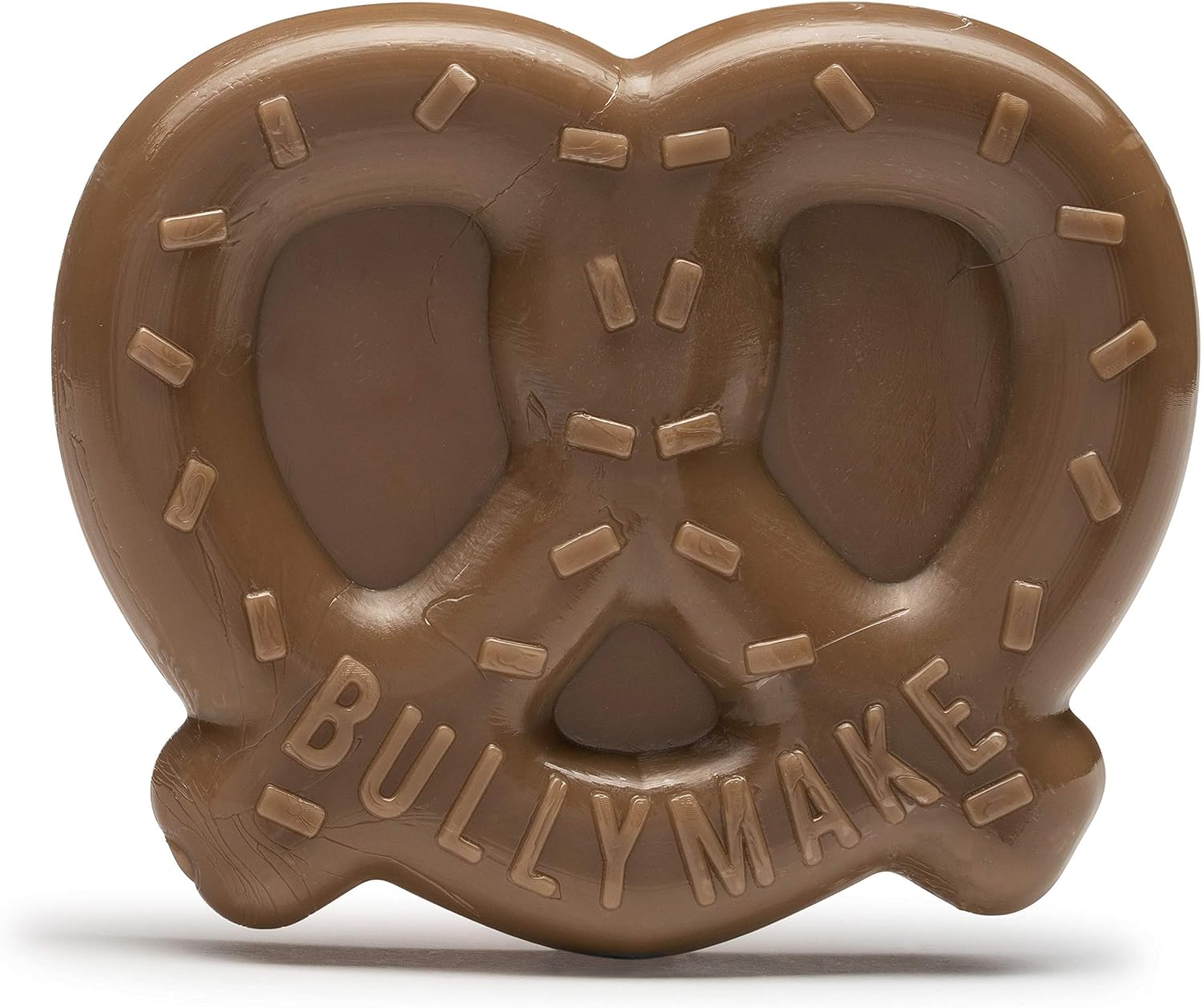 Comparison shot of Bullymake steak toy next to other dog accessories.