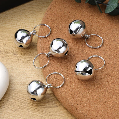 Small dog wearing ukcoco metal collar bell charm