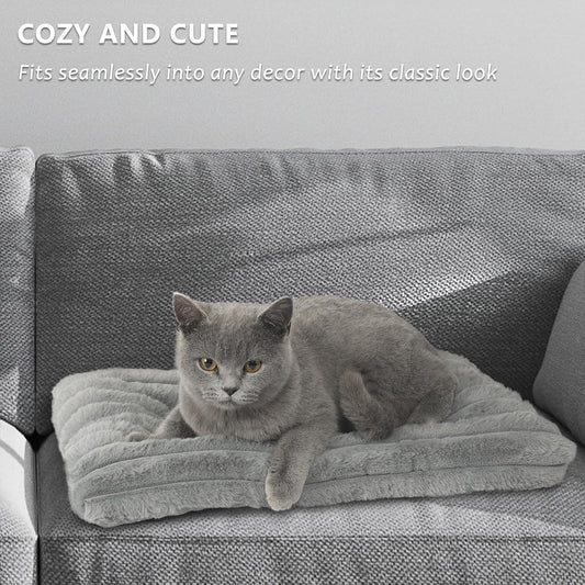 Plush flat cat bed cushion showing the anti-slip rubberized bottom surface for stability.