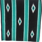 Durable hemline edges details on the turquoise green and black Majestic Ally blanket.