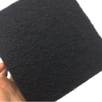 Pack of six black activated carbon odor filters stacked together