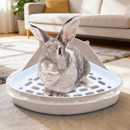 Upcessory cage liners being placed on a bunny habitat tray