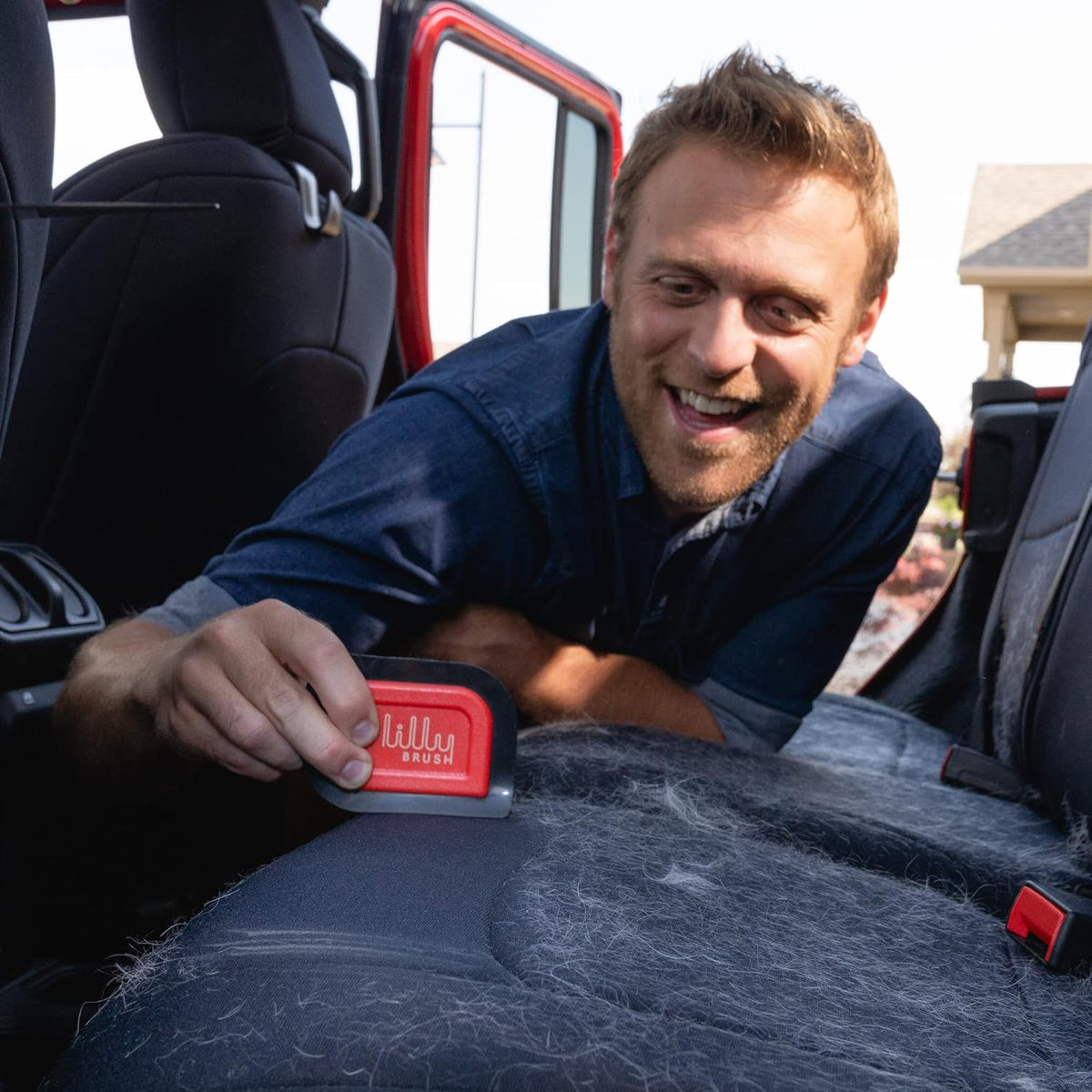 Close-up of the patented soft rubber blade on the Lilly Brush car detailing tool.