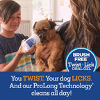 Dog licking Vetality dental gel from applicator