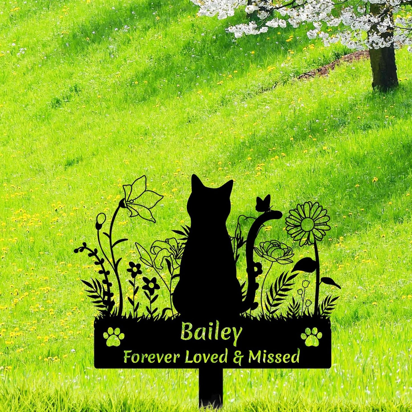 Floral and butterfly detail on cat memorial stake