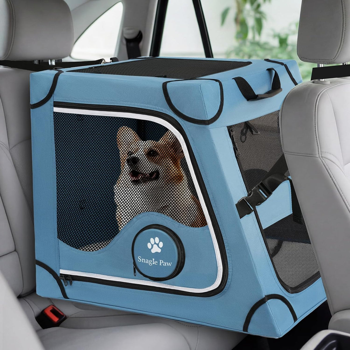 Snagle Paw portable dog crate for car travel front view showing blue oxford cloth and mesh door