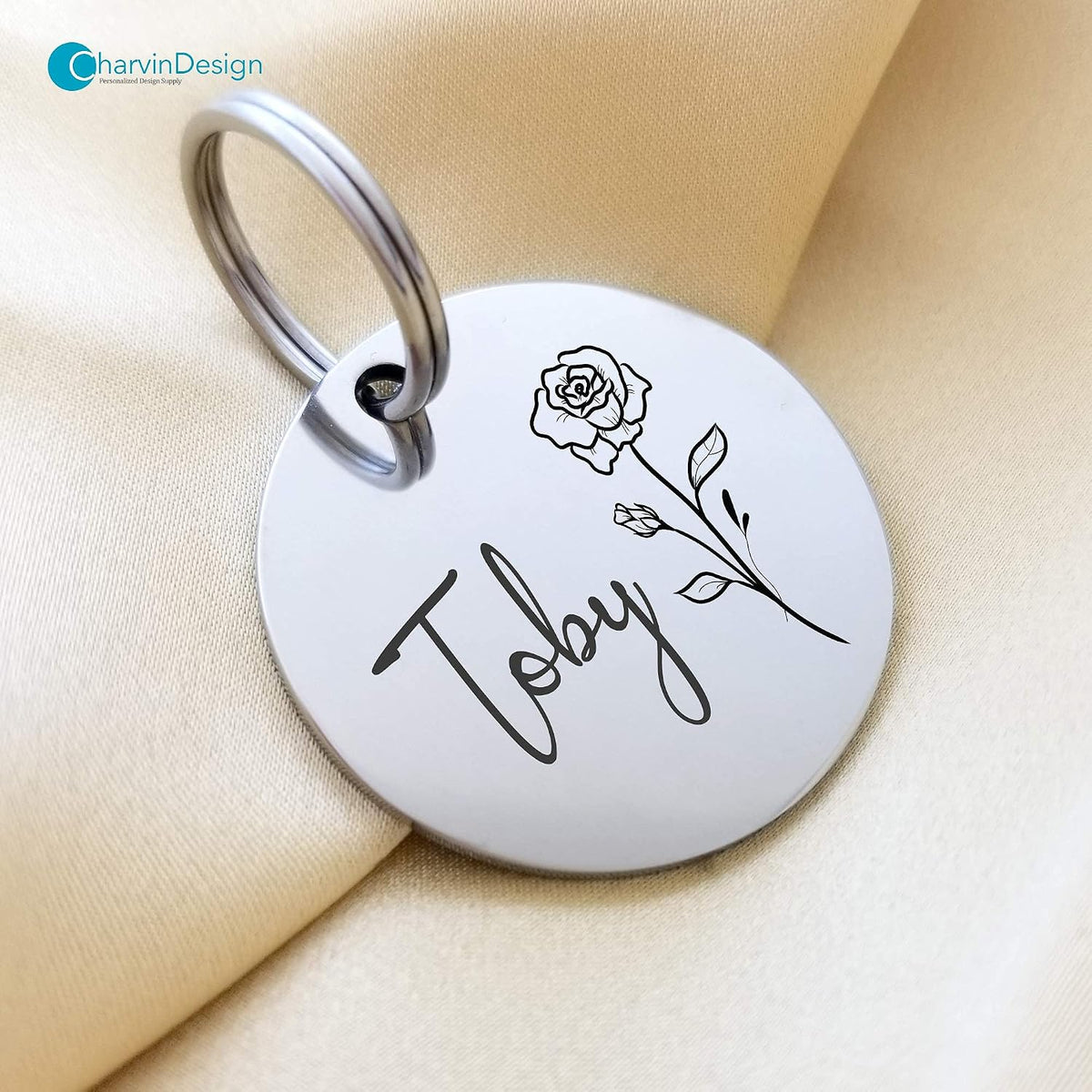 Twenty&Sixty personalized pet collar tag close up showing deep text engraving for phone numbers