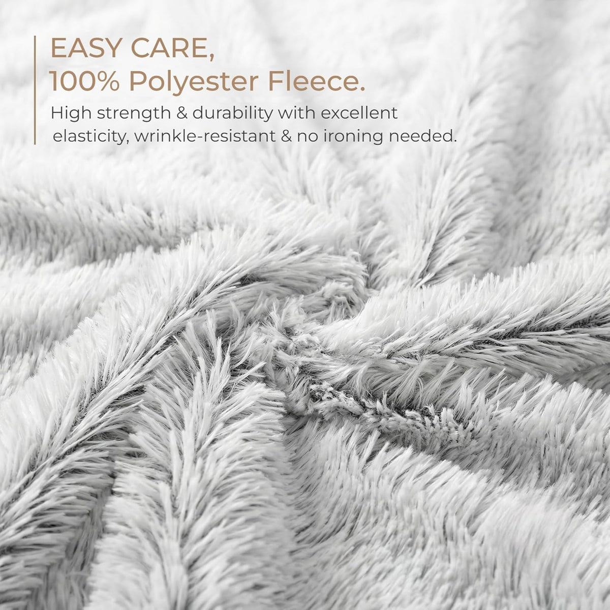 Plush double-sided polyester fleece puppy blanket draped neatly over a living room sofa armrest.