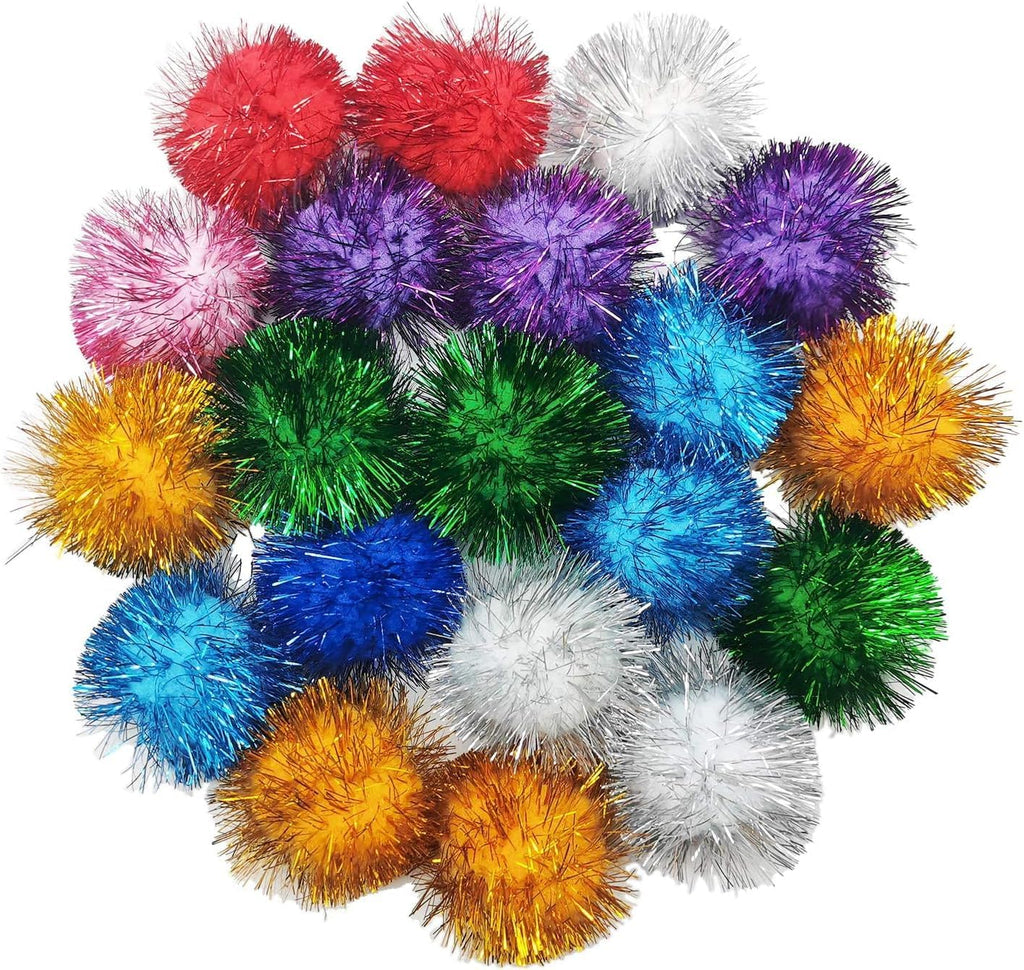 Hand holding a two inch sparkling tinsel toy ball