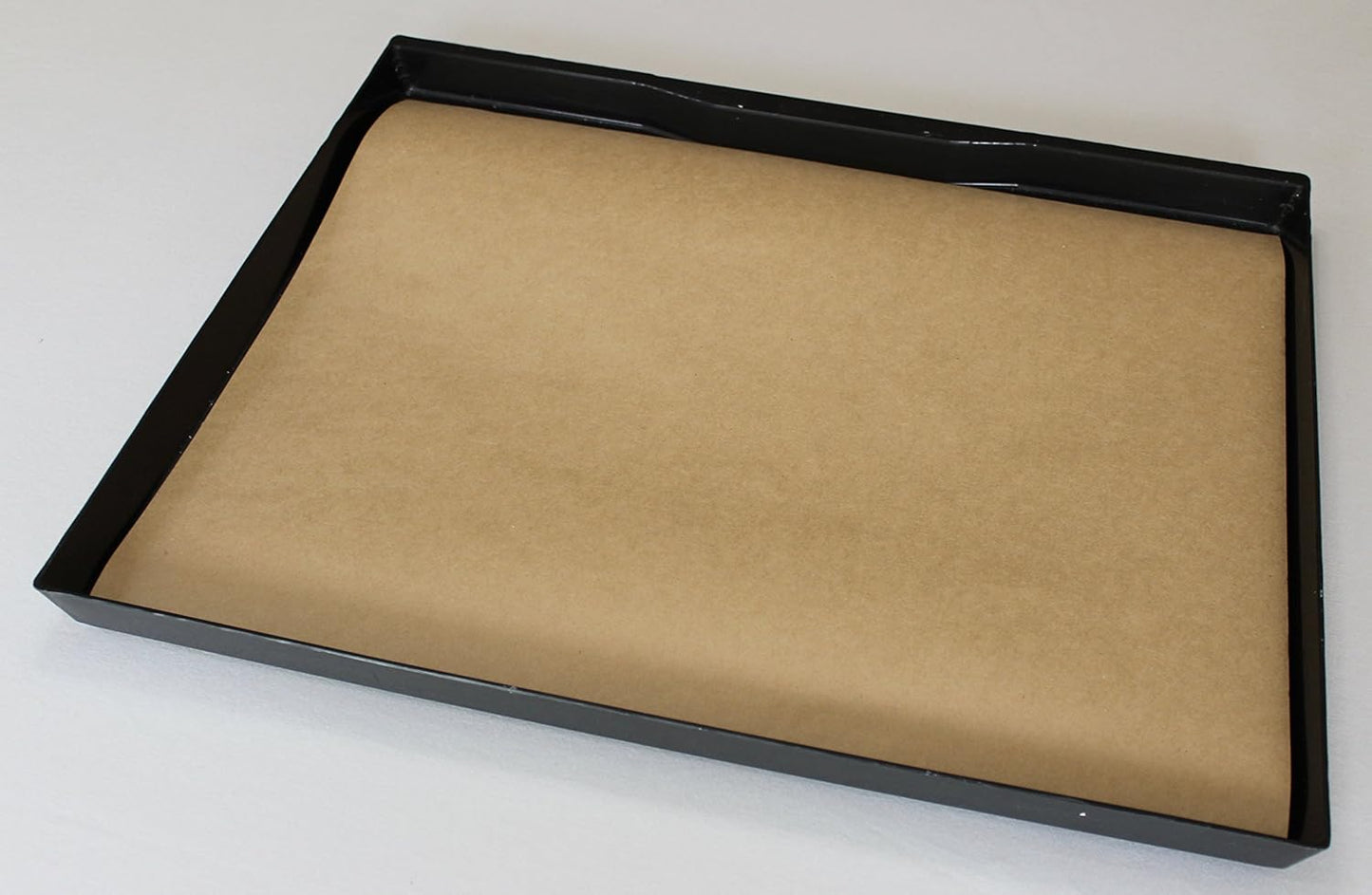 Close up view of durable 60 pound kraft paper texture for bird cages