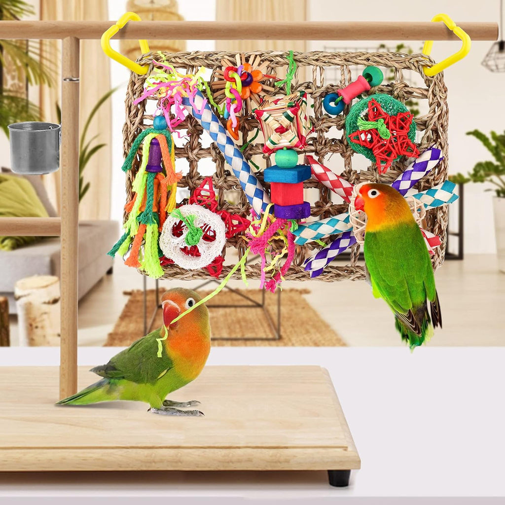 Colorful wooden blocks and rattan balls on a bird foraging toy.