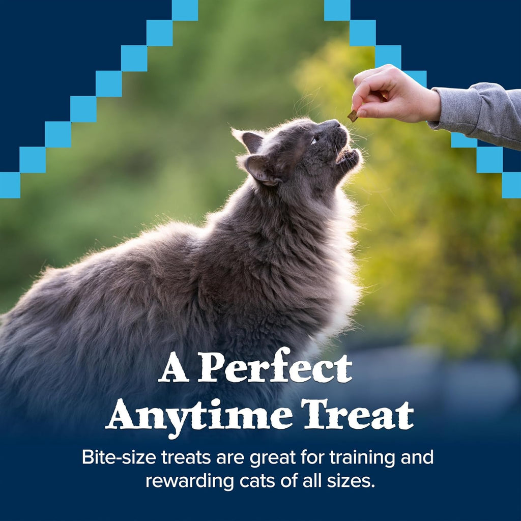 Blue Buffalo cat treats pouch displayed next to natural ingredients
